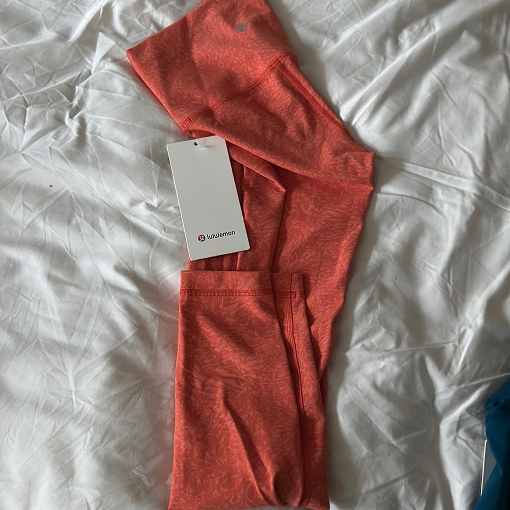 Lululemon women’s Wunder Train HR Tight 25”, size 2, color CRWC